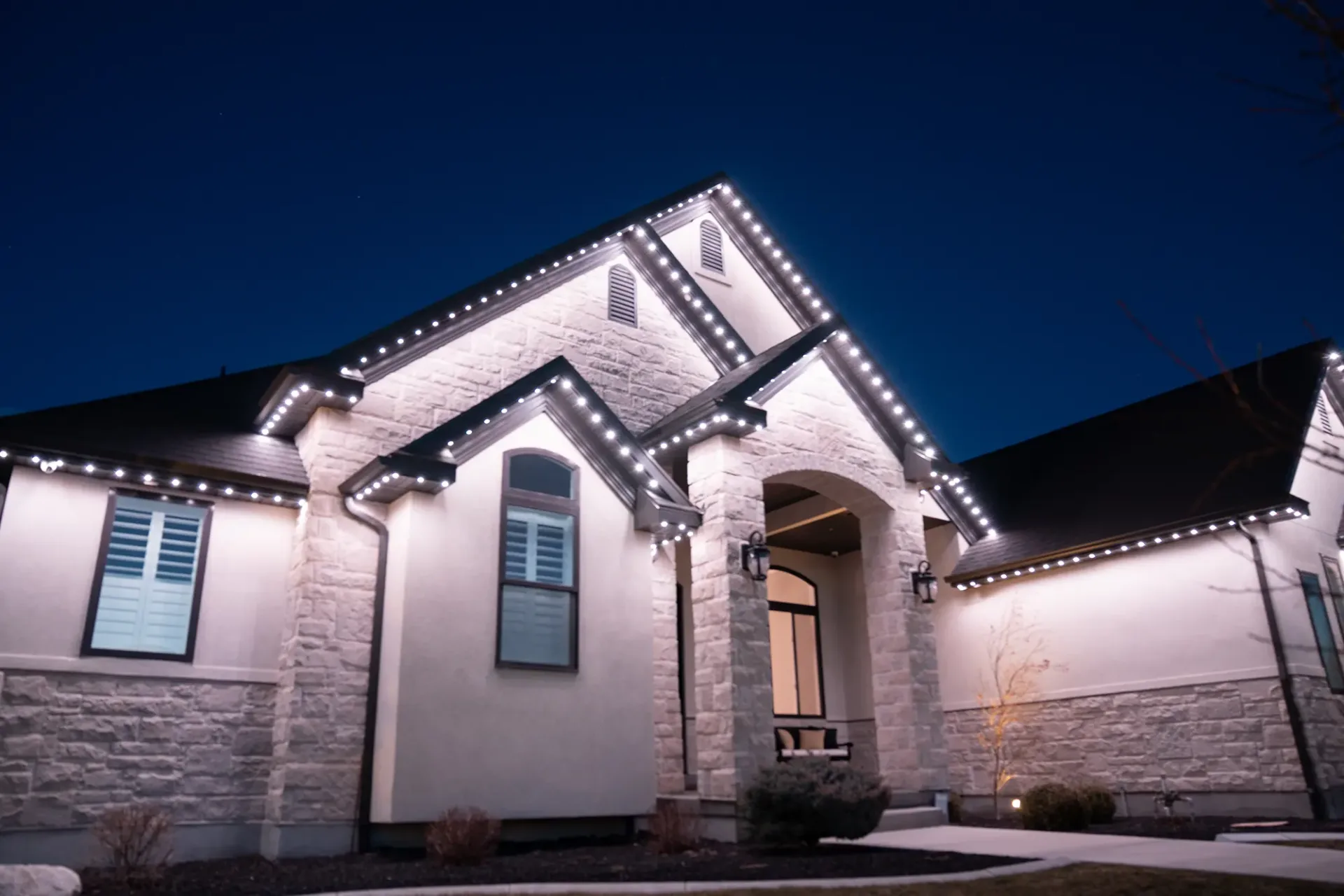 Driveway and garage lit by Happy's security preset