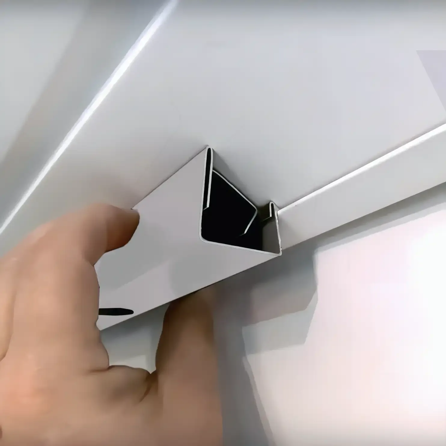 Canted Happy's track on an angled soffit