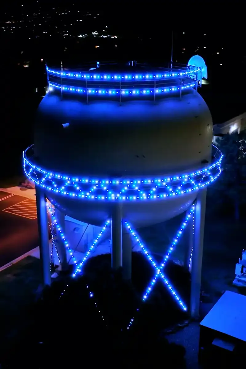 Water tower lit with Happy's lighting