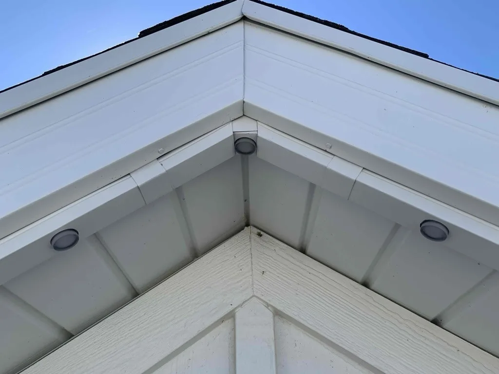 Home with security lighting in an HOA community