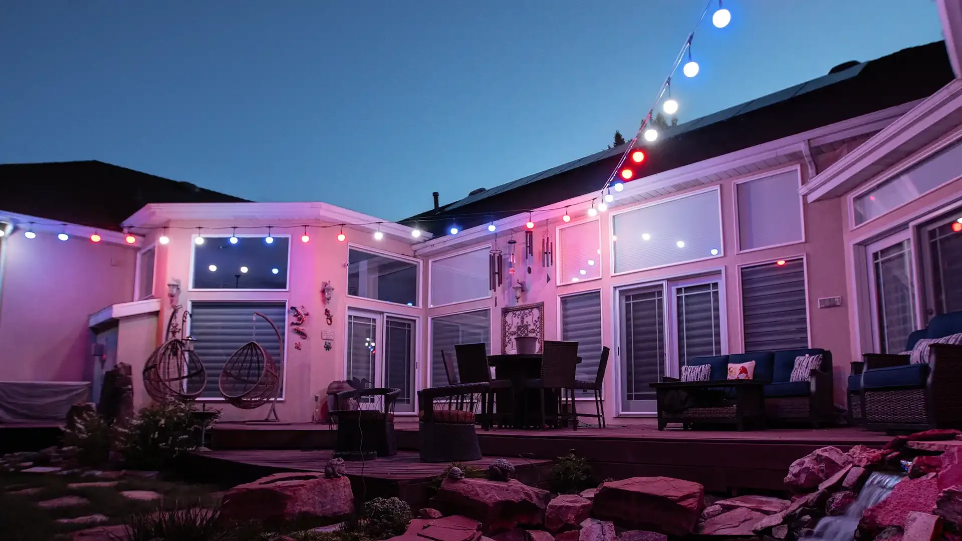 Happy's patio lights over a garden path