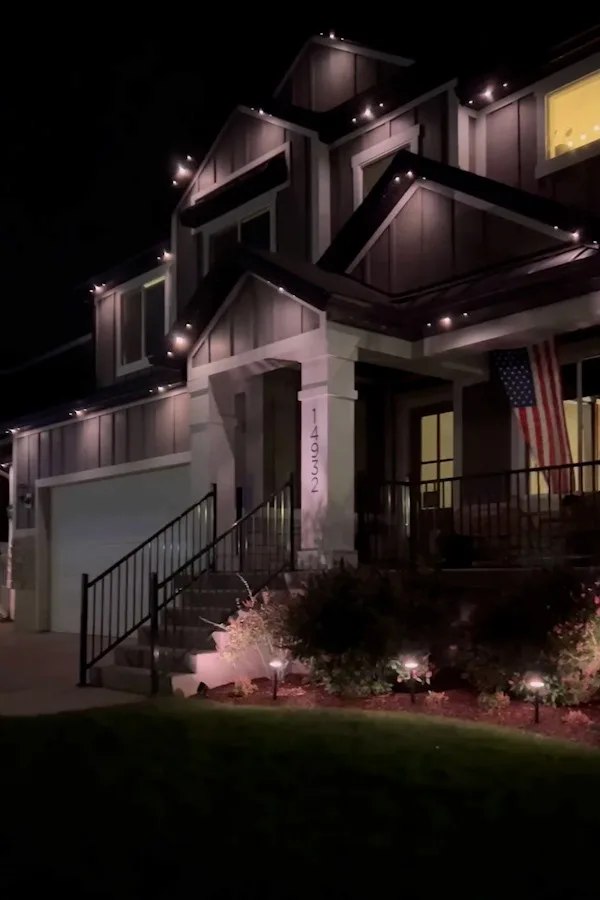 Home with warm white Happy's accent lighting along the roofline