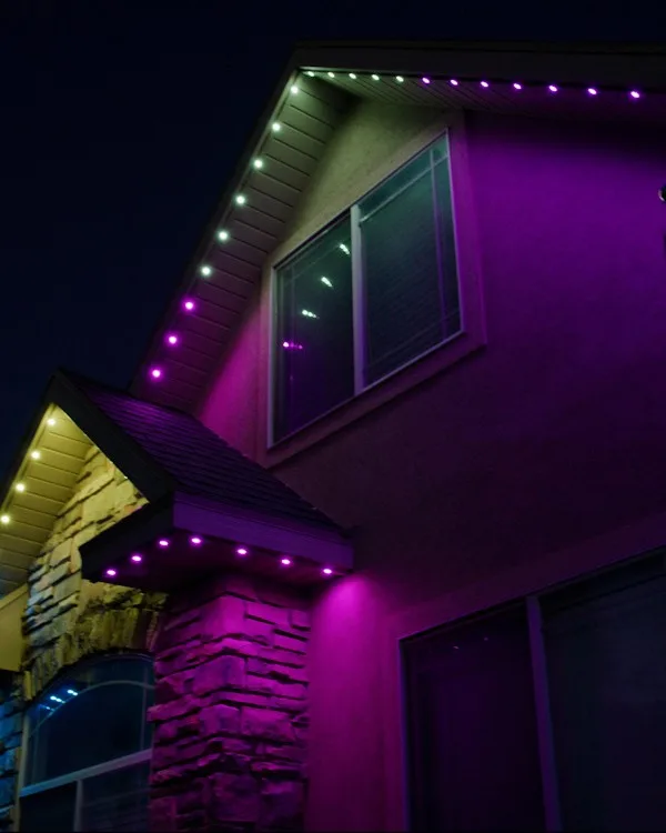 Home lit in purple team colors with Happy's gameday lighting