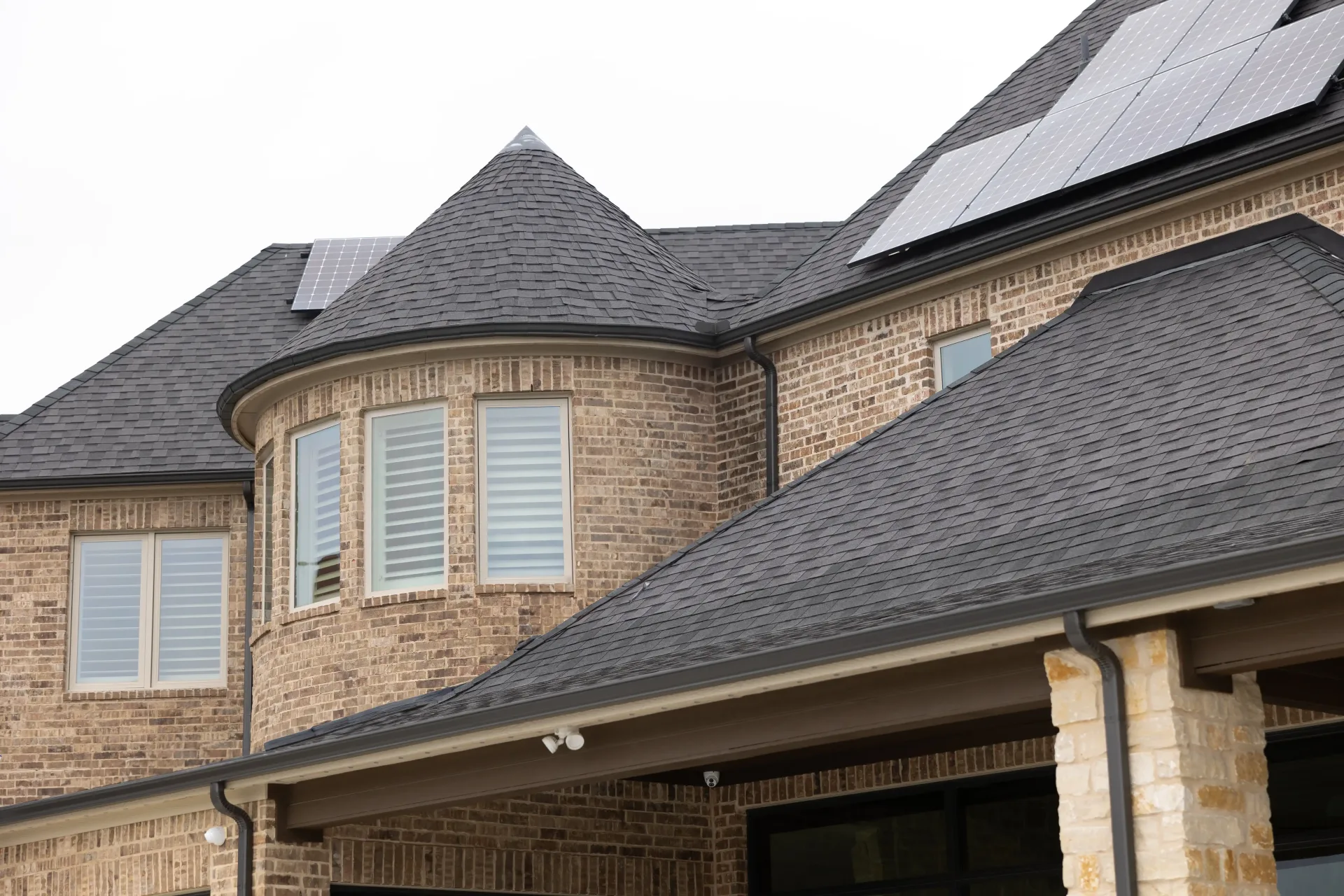 Daytime view of a home where the Happy's track is color-matched and nearly invisible