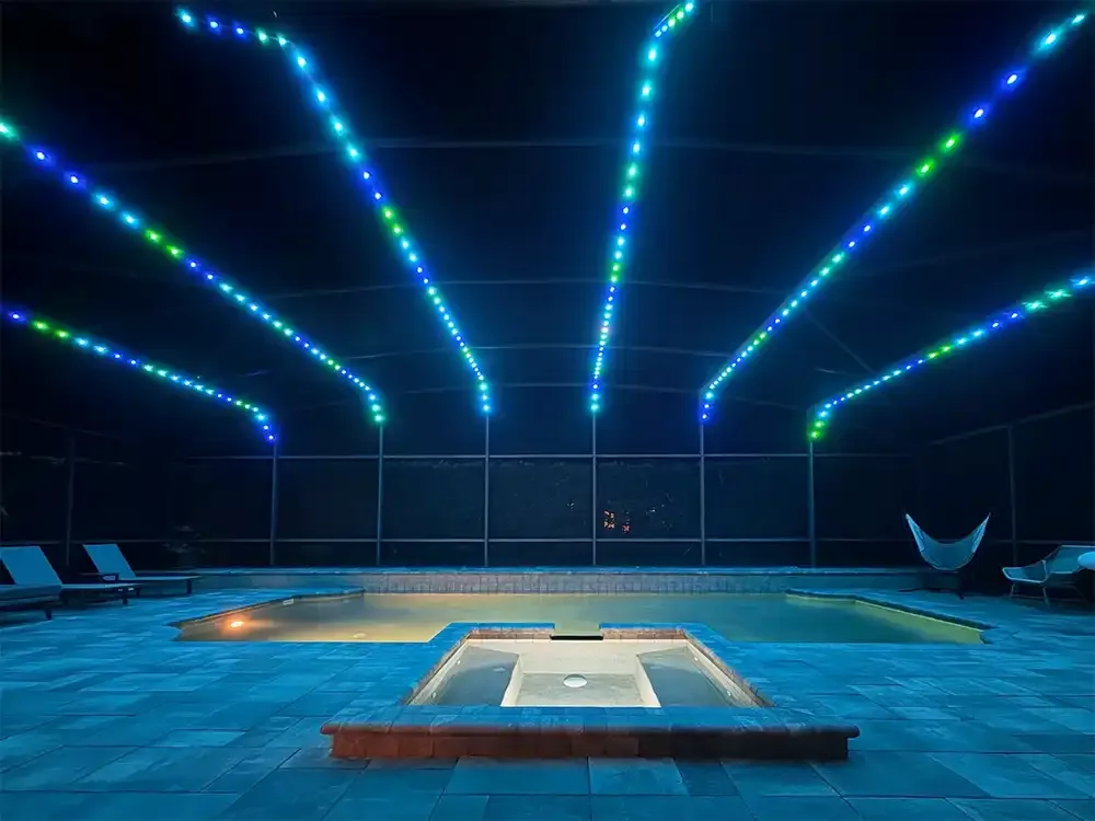 Weather-resistant Happy's lights on a pool enclosure